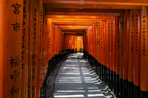 empty tunnel between red walls