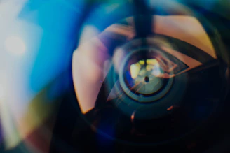 a blurry photo of a person holding a camera