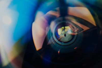 a blurry photo of a person holding a camera