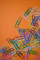 assorted-color safety pin collection