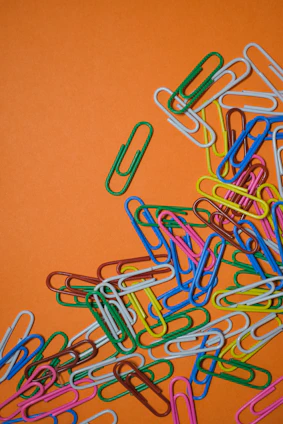 assorted-color safety pin collection