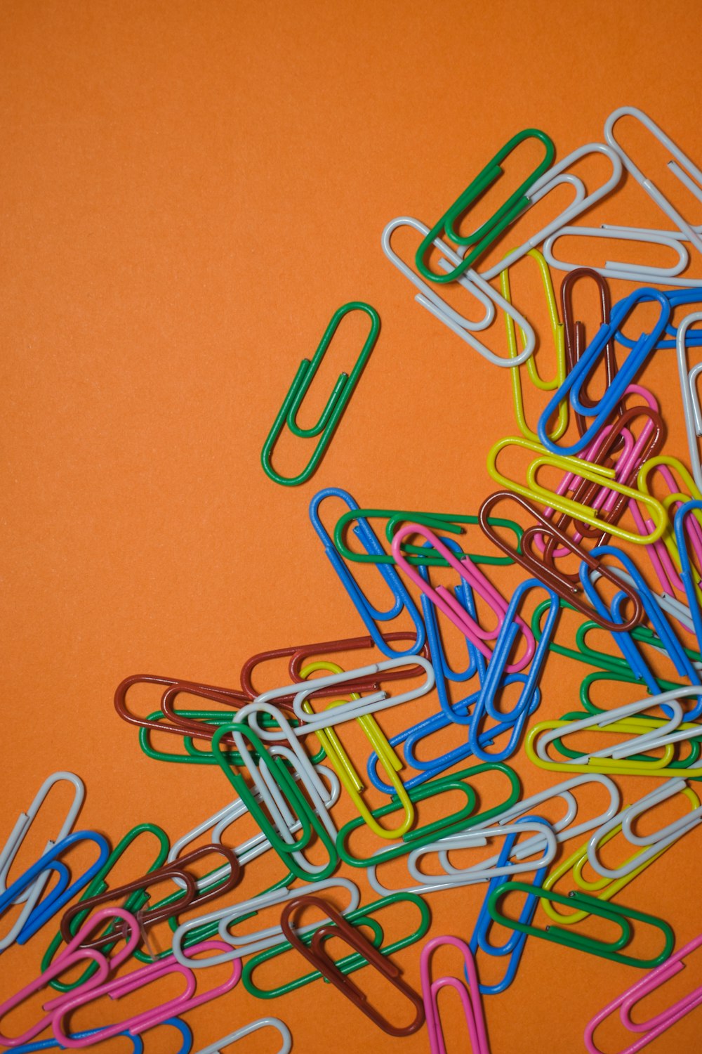 assorted-color safety pin collection