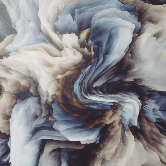 an abstract painting of blue, brown, and white colors