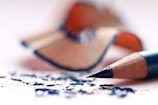 selective focus of blue colored pencil