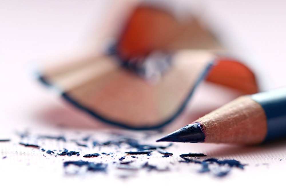 selective focus of blue colored pencil