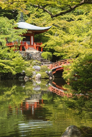 red temple near body of water