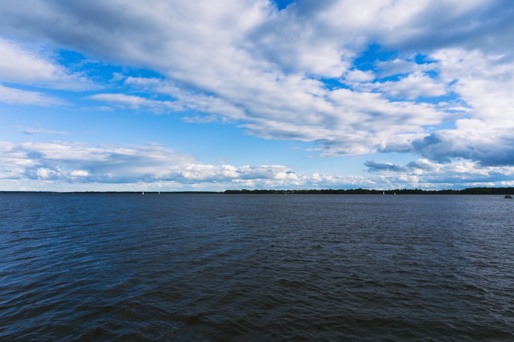 calm body of water during daytim