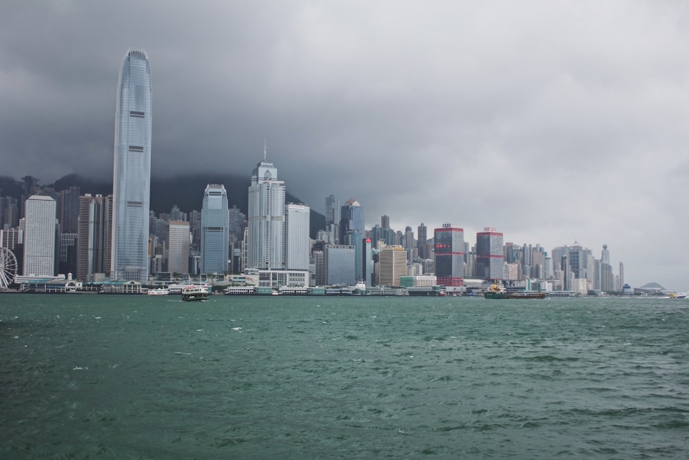 city with high-rise buildings near sea