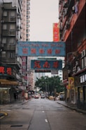 blue signs near buildings