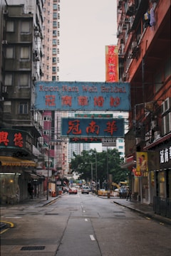 blue signs near buildings
