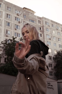 woman wearing gray jacket