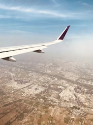 Aerial view of plots near Noida International Airport with clear skies.