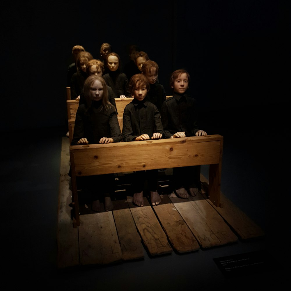 children sitting in front of table