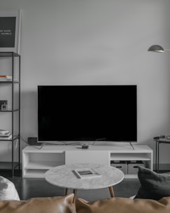flat screen TV displaying black screen