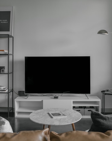 flat screen TV displaying black screen