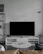 Modern living room setup showing a sleek connectivity box blending with the decor.