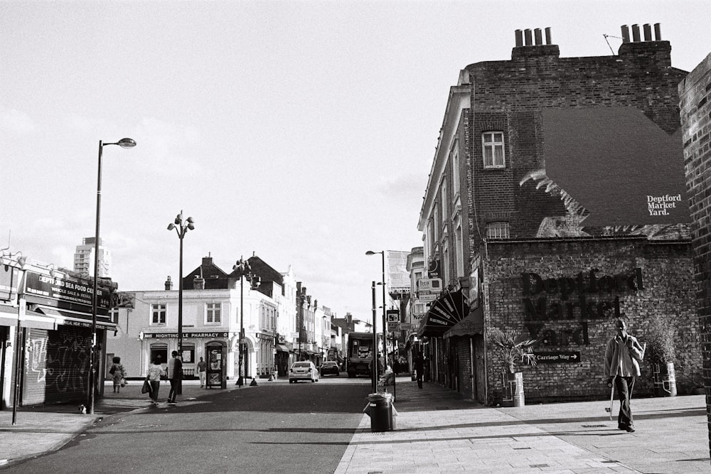 greyscale photo of buildings