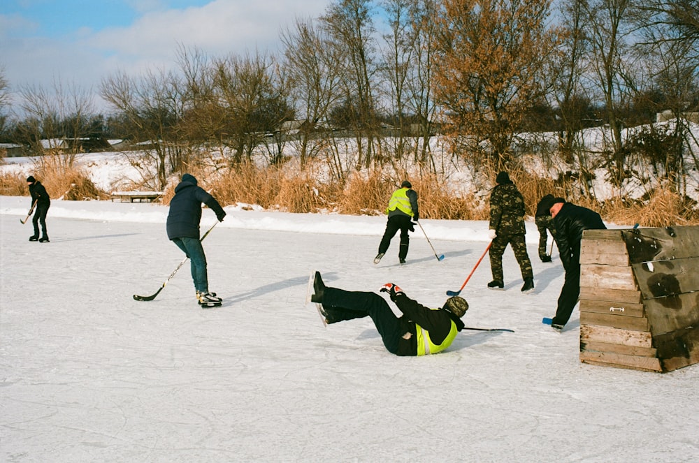 people skating on field