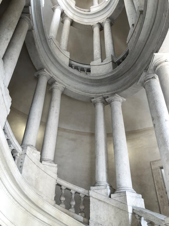 low angle photo of grey concrete stair in National Gallery of Ancient Art in Barberini Palace Italy