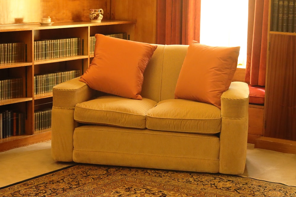 brown 2-seat sofa