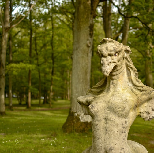 bird with human body and wings statuette