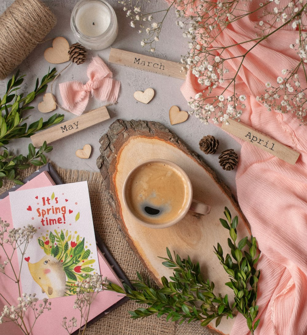 flatlay photography of ceramic mug on brown wood