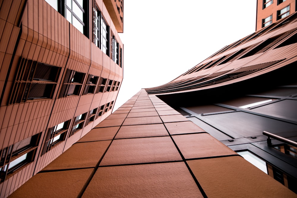 low-angle photography of brow building