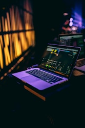 black and grey laptop computer on desk
