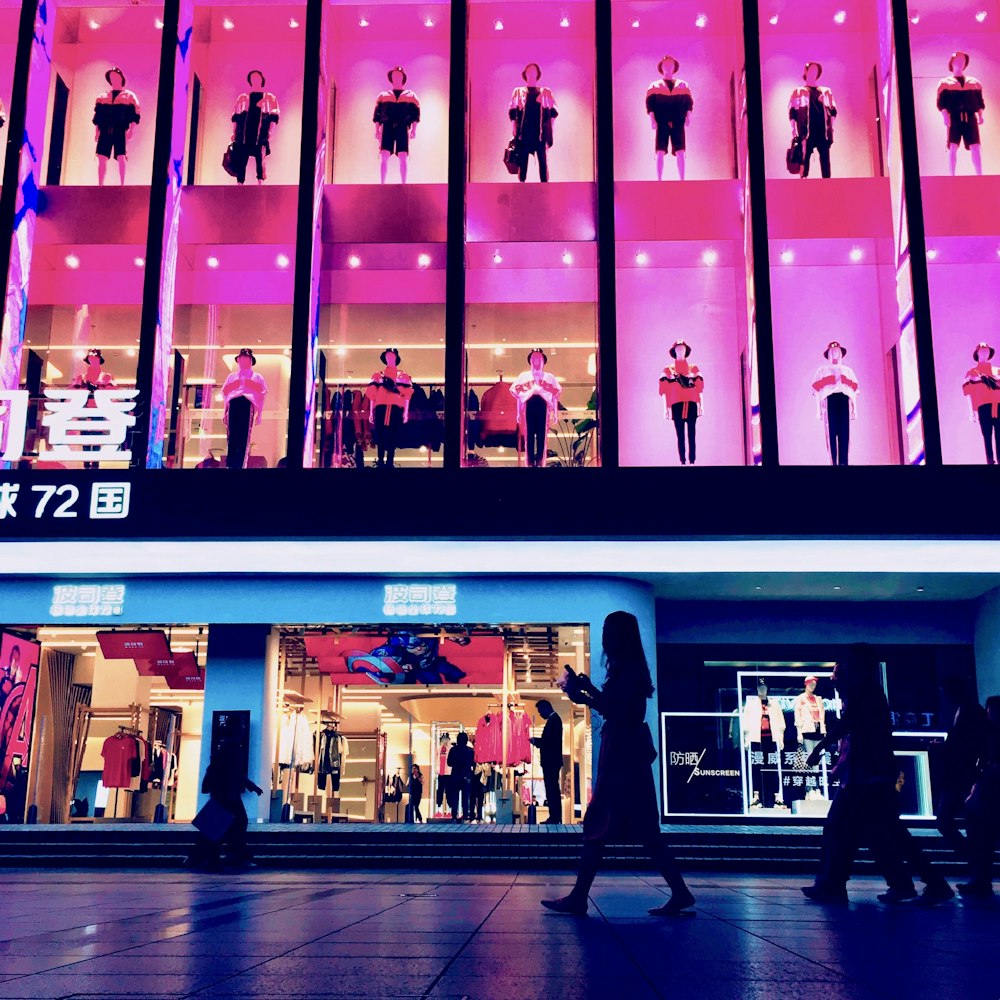 people walking near building