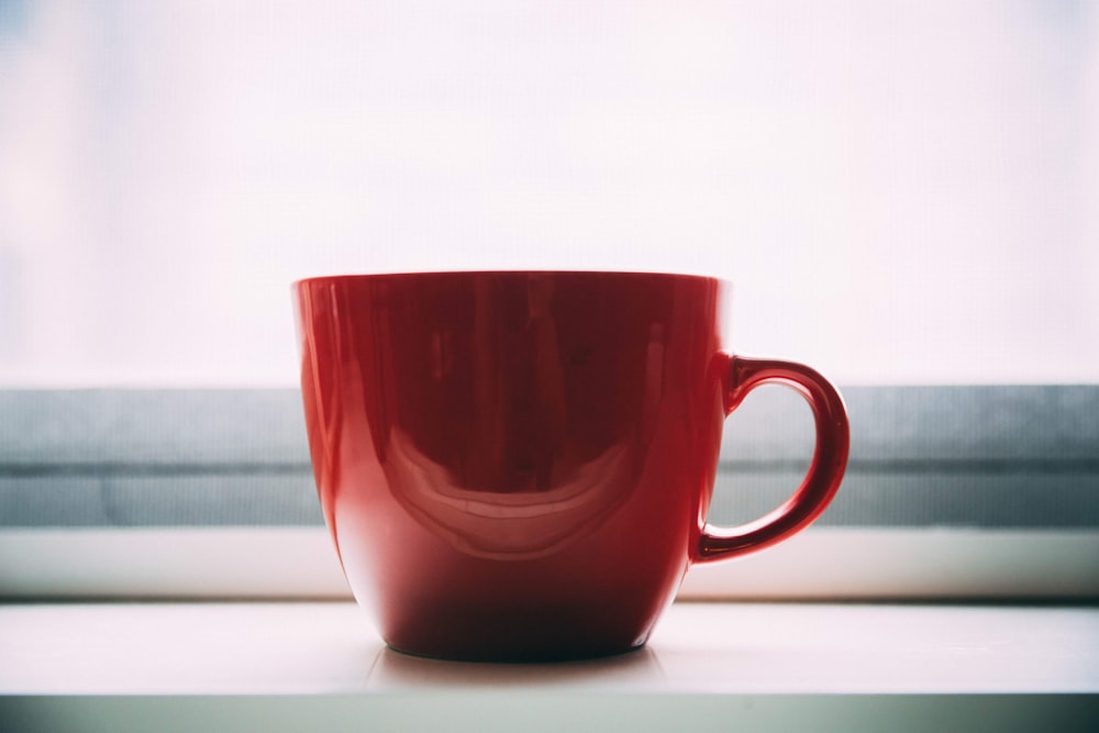 red ceramic mug