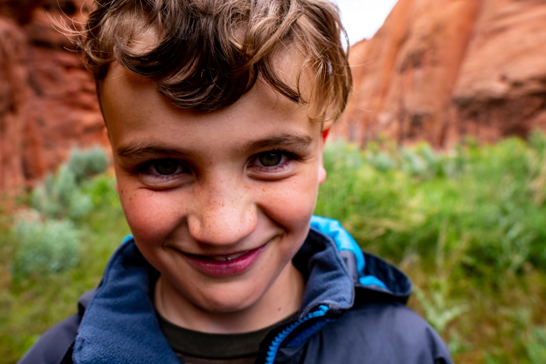 boy in blue collared top