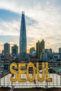 Elegant Seoul cityscape at dusk with subtle cultural details and a calm, sophisticated atmosphere.