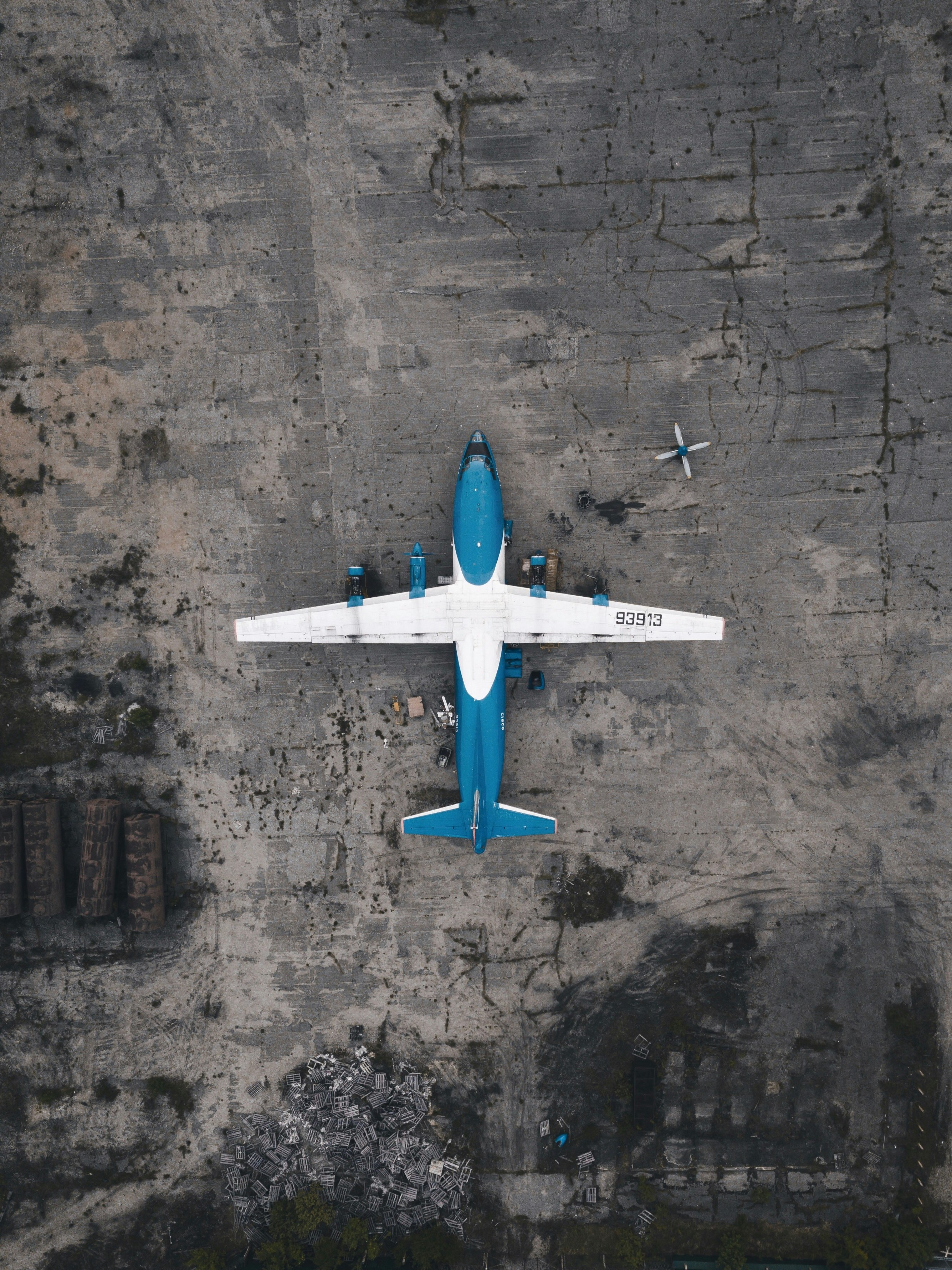 aerial photography of white and blue airplane