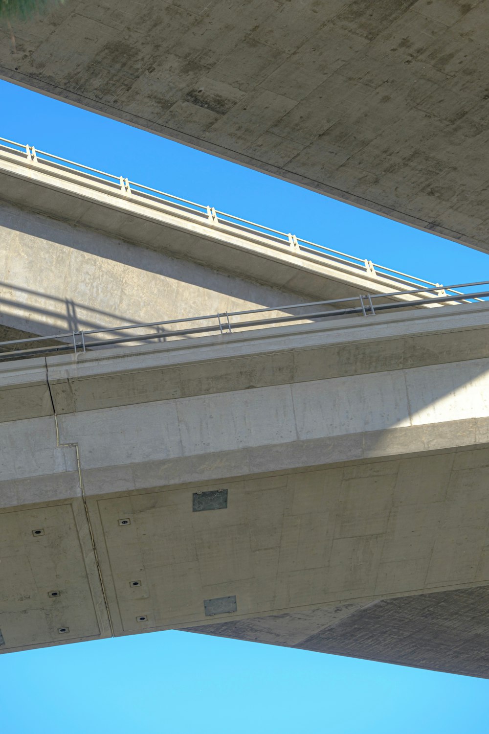 a view of the underside of a bridge from below