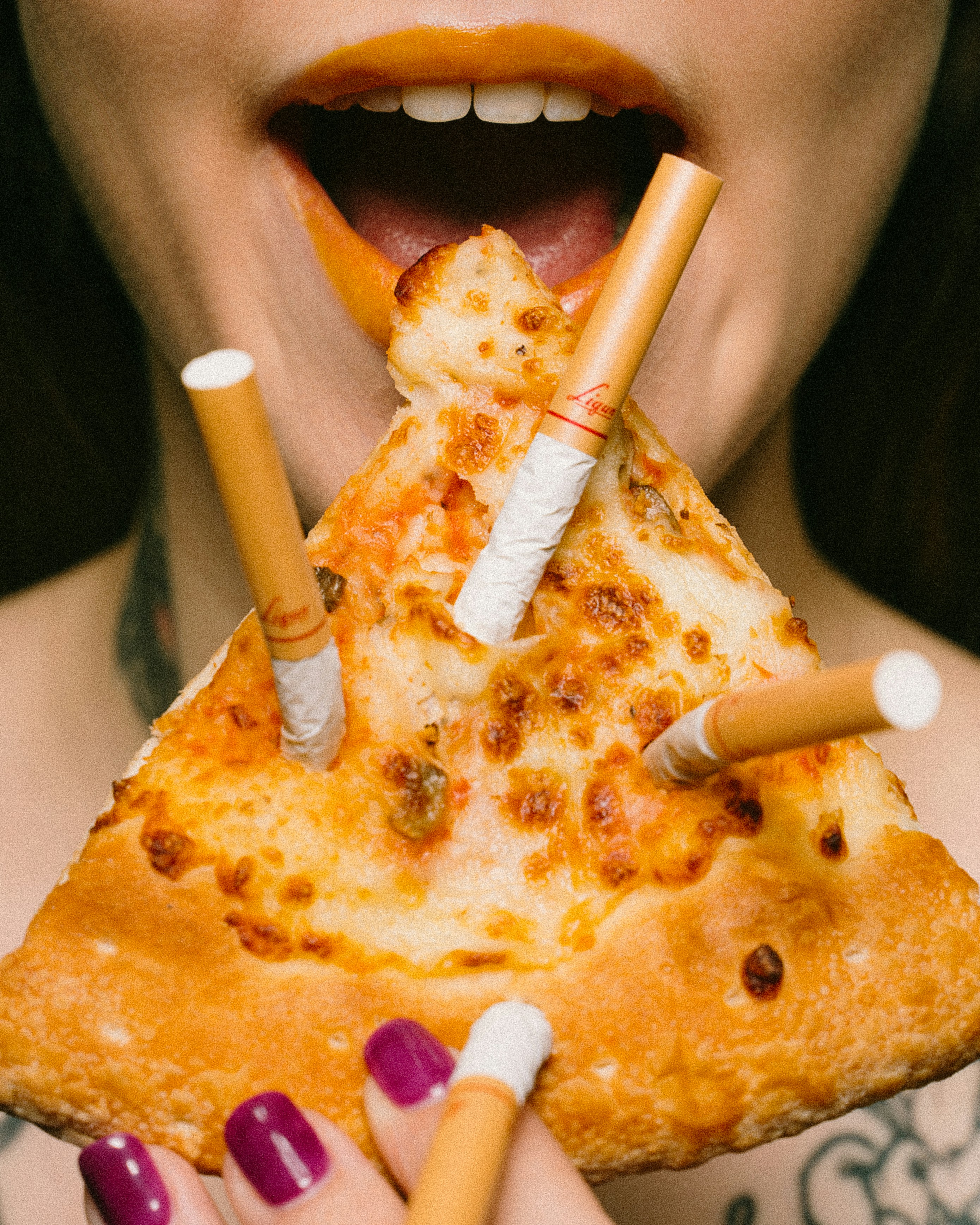 slice of pizza with three cigarette sticks photo Free Food Image on