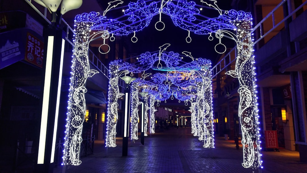 white and blue string lights pillars turned-on