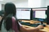 woman using desktop computer