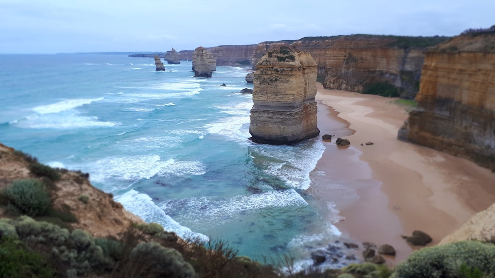 seashore near rock formations and clif