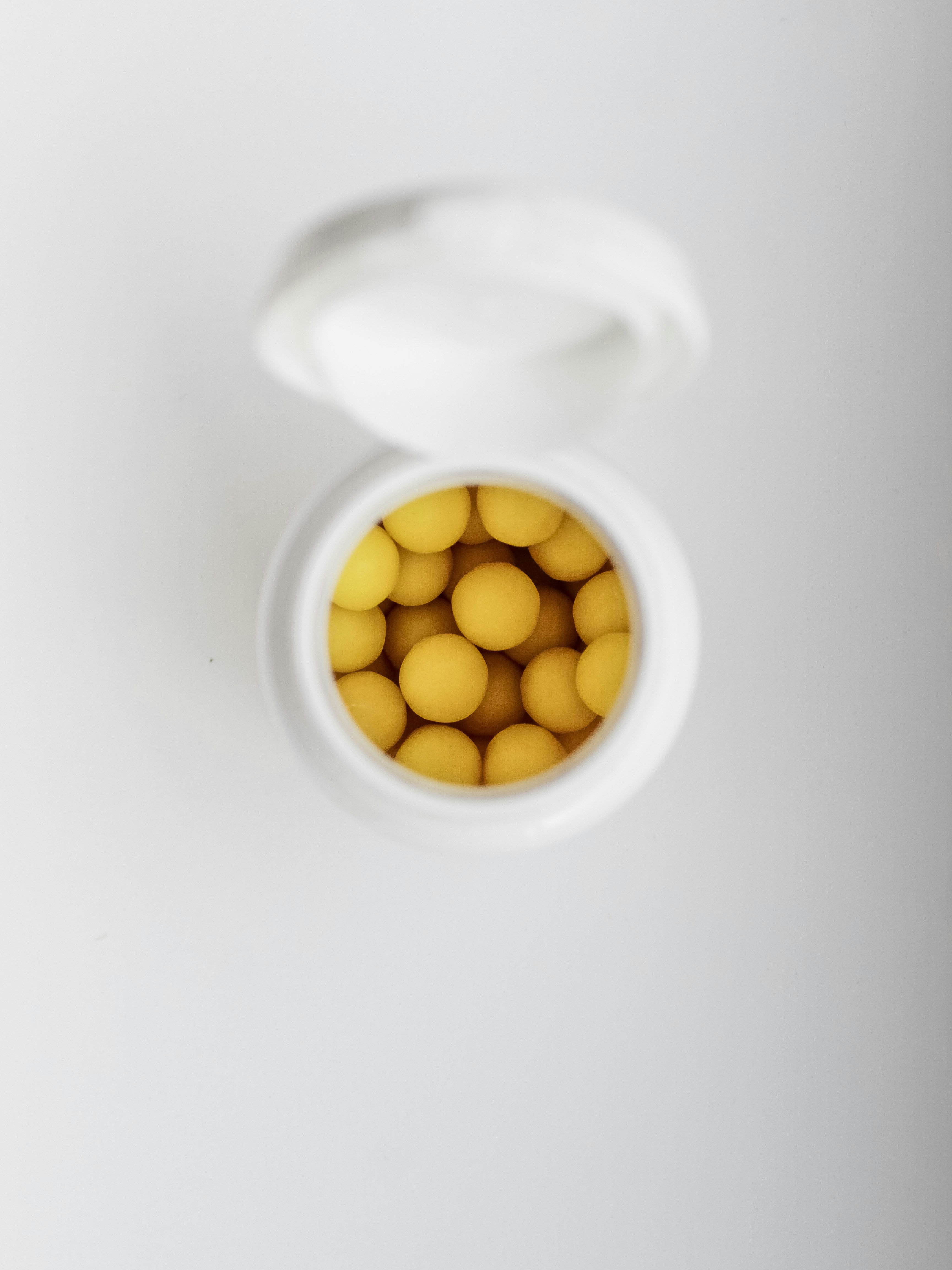 yellow balls in bottle