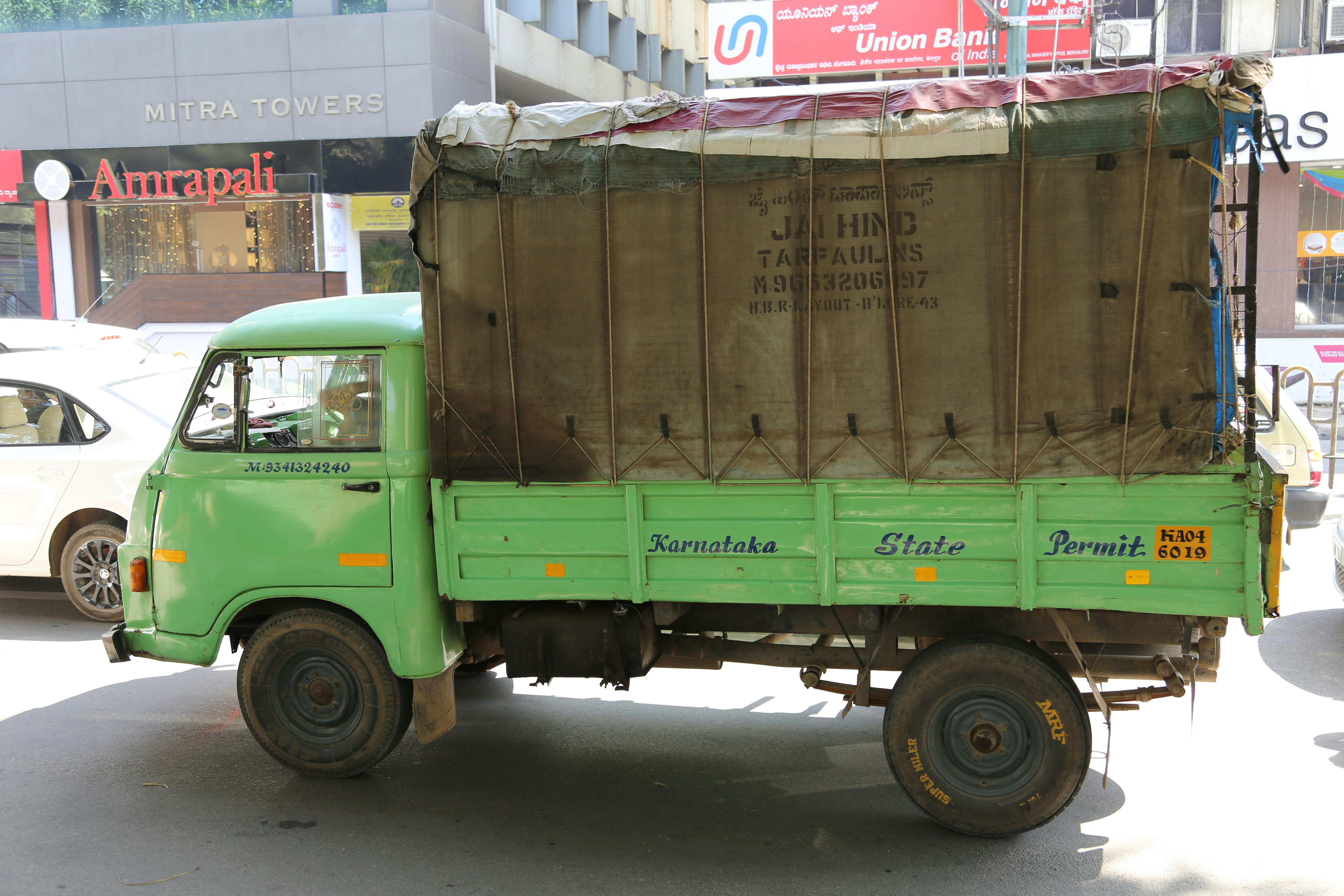 Light green truck in the streets of Bengaluru, India
