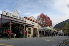 people standing near The Wool Press building