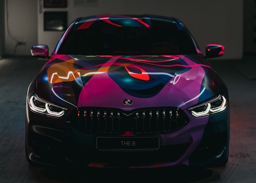 black and purple BMW vehicle
