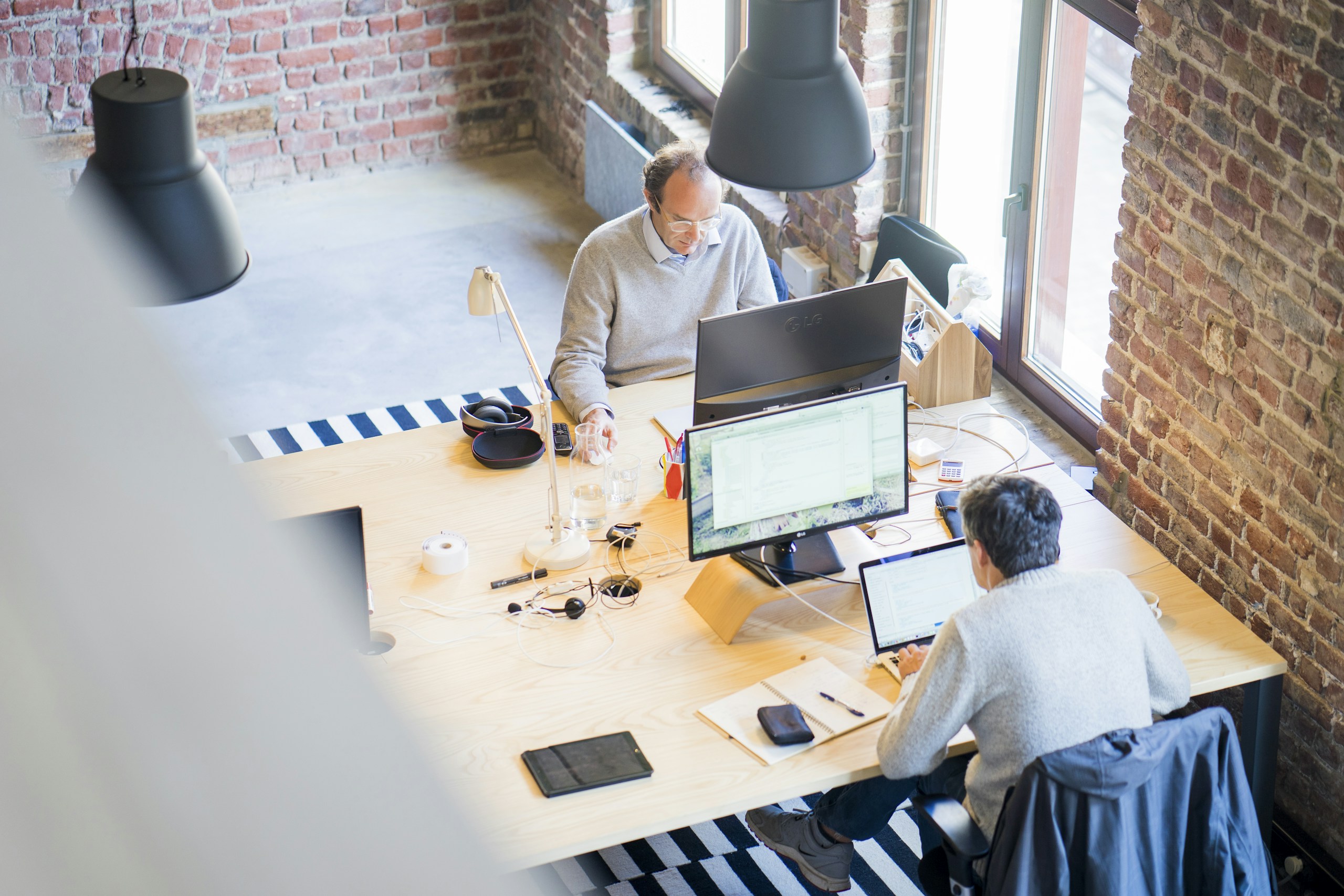 two men using computers