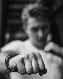 A close-up shot of a champion’s intense expression just before a decisive slap.