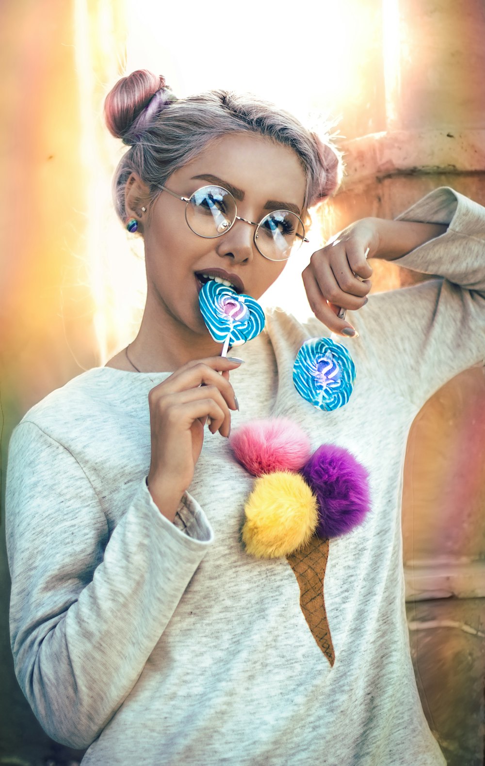 woman eating heart shape swirl lollipop