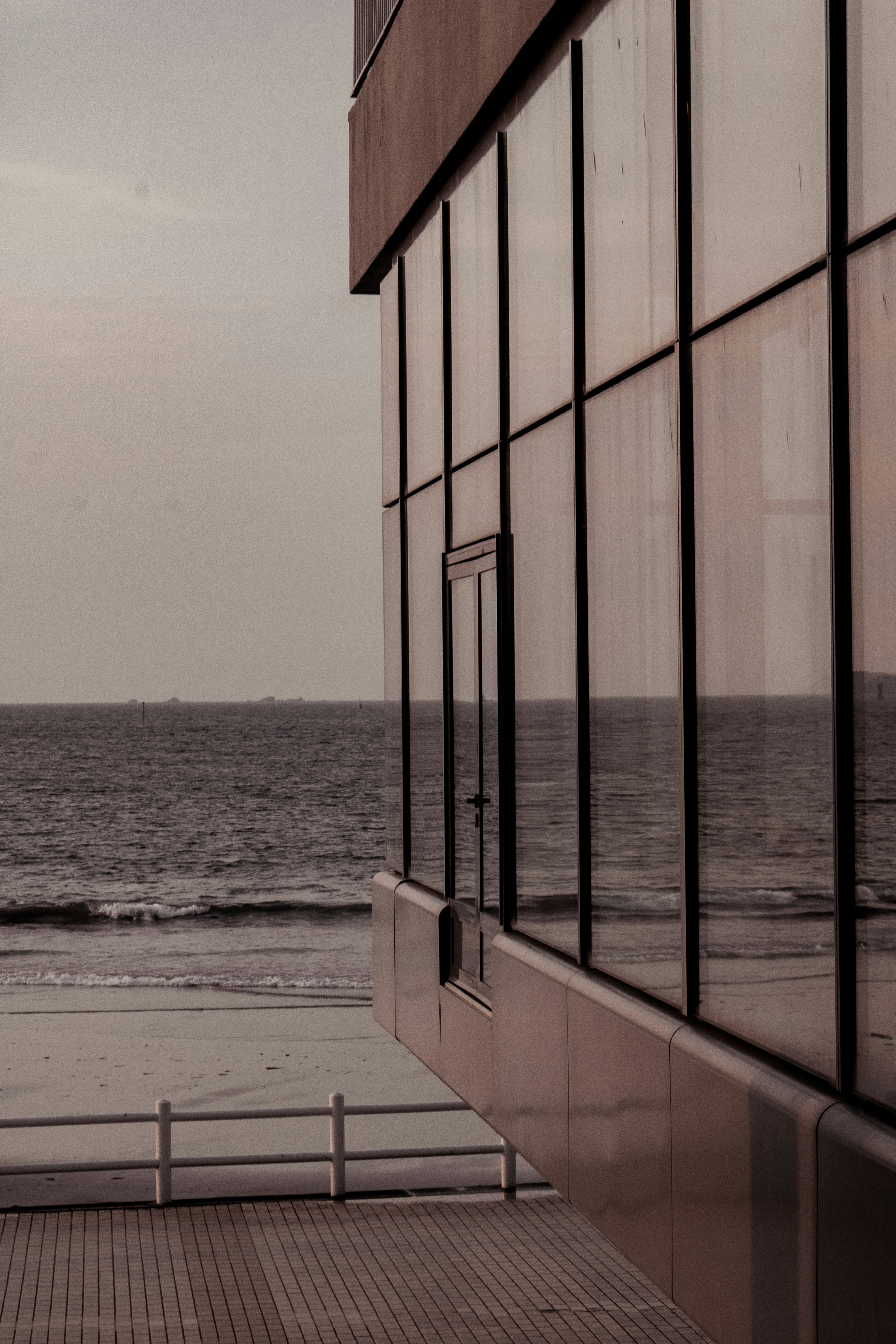 building near body of water during daytime