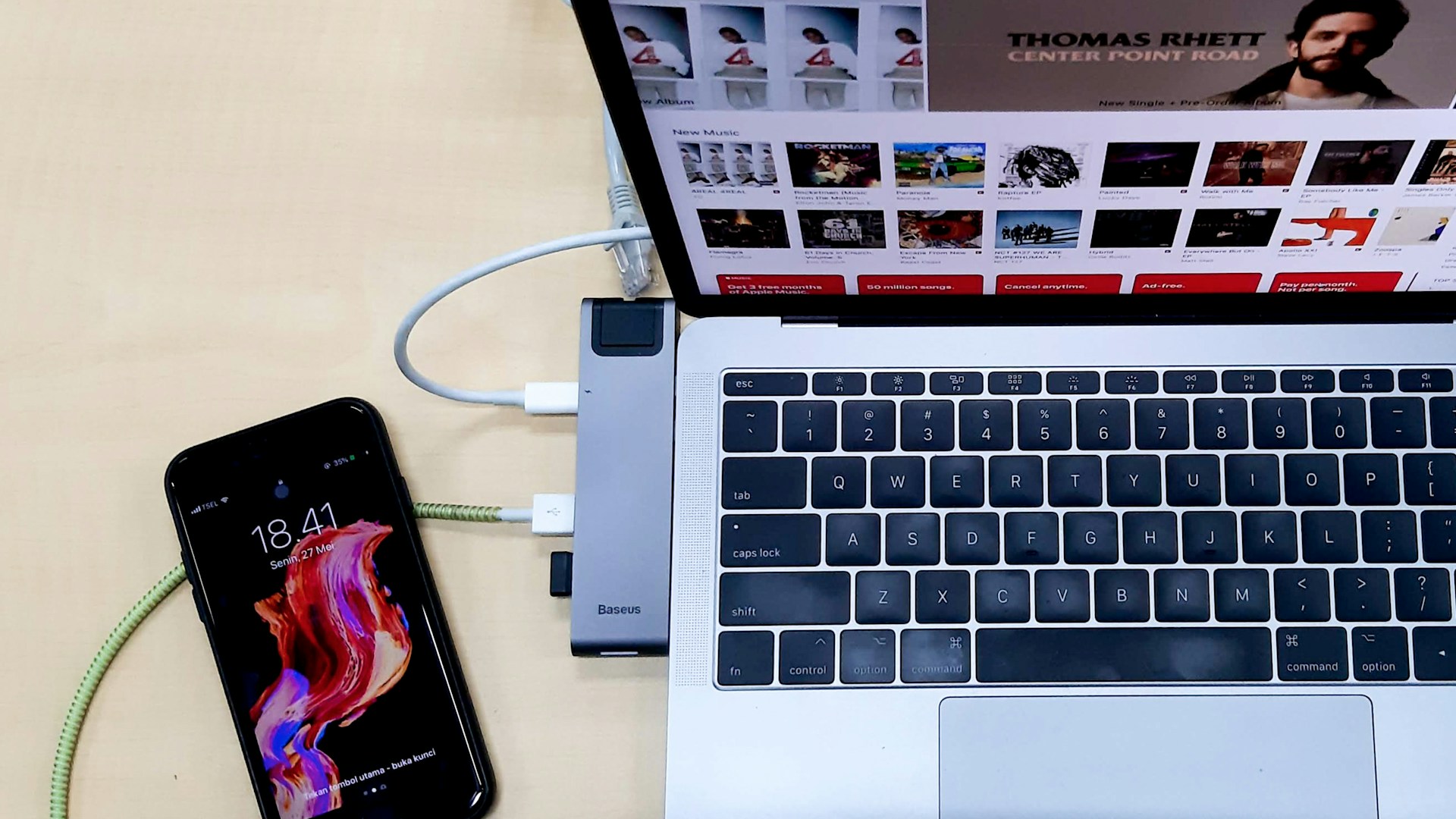 silver laptop computer turned-on