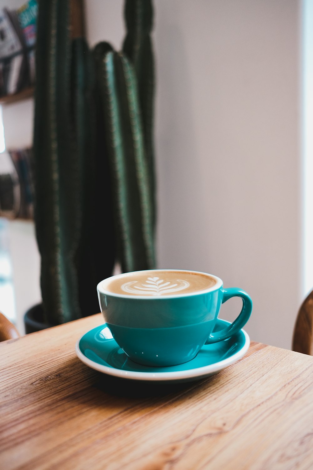 blue ceramic teacup with saucer