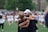 A close-up of a sports team celebrating a victory, showcasing teamwork and success.