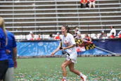 Monie celebrating a milestone victory with teammates and supporters.
